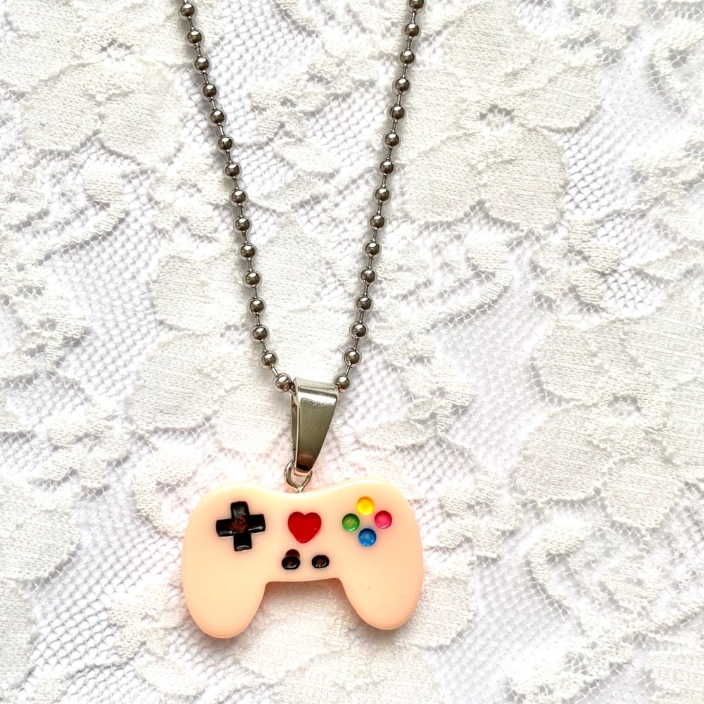 Peachy pink Super Nintendo controller necklace